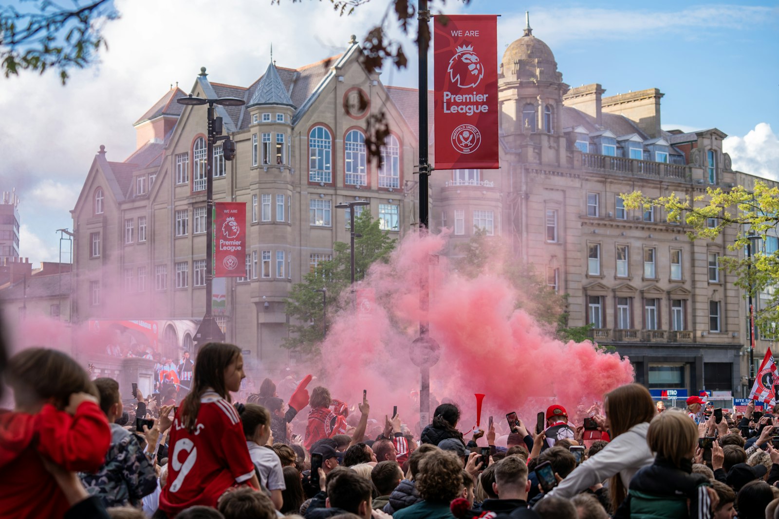 Sheffield United supporters celebrating in the city centre